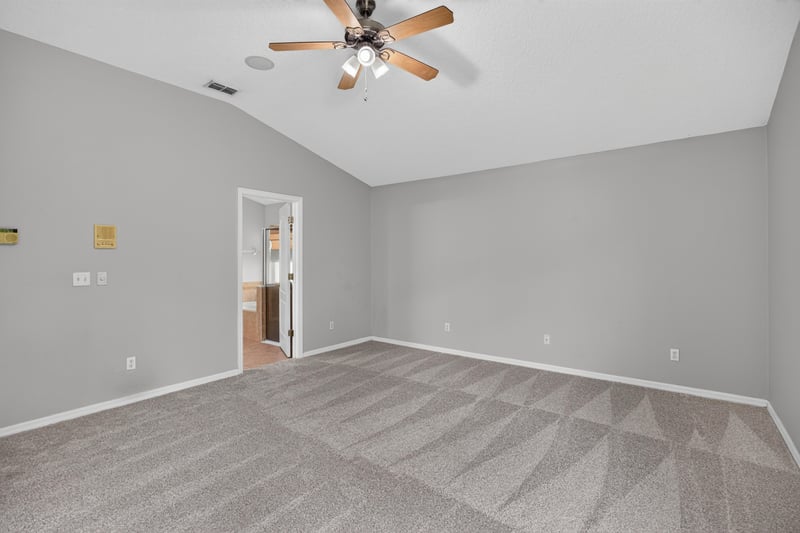 Small bedroom with closet door at 635 Wakeview Dr, Orange Park, FL 32065
