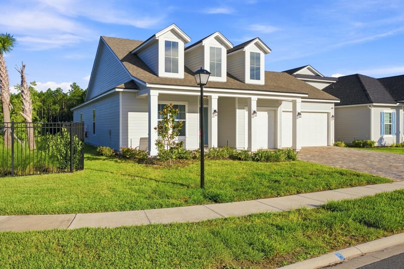 Front exterior with lamp post and paver walkway at 27 Holly Rdg Wy, St. Augustine, FL