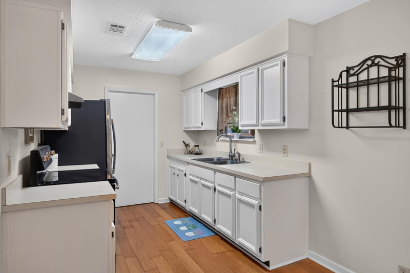 Kitchen counter and sink below window at 2829 Blackberry Ave