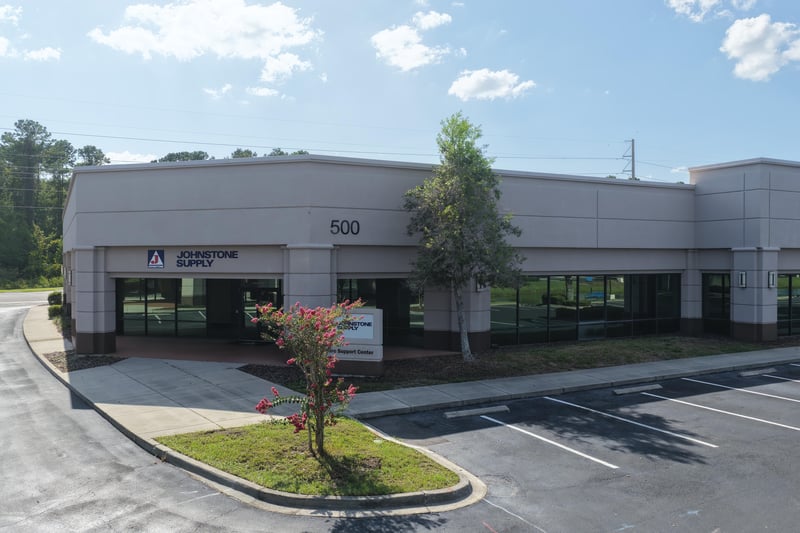 Building front with 500 address numbers and entry at 10550 Deerwood Park Blvd, Jacksonville, FL 32256