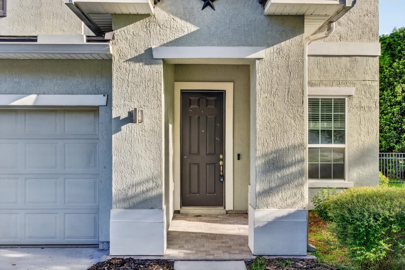 Front door and garage door close up at 13685 Goodson Pl, Jacksonville, FL 32226