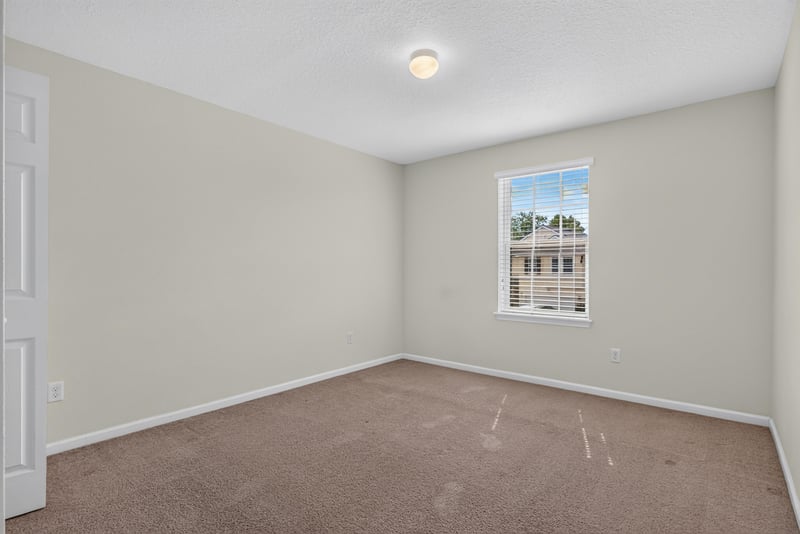 Bedroom with carpet and window at 263 Gilmore Ln, Orange Park, FL 32065