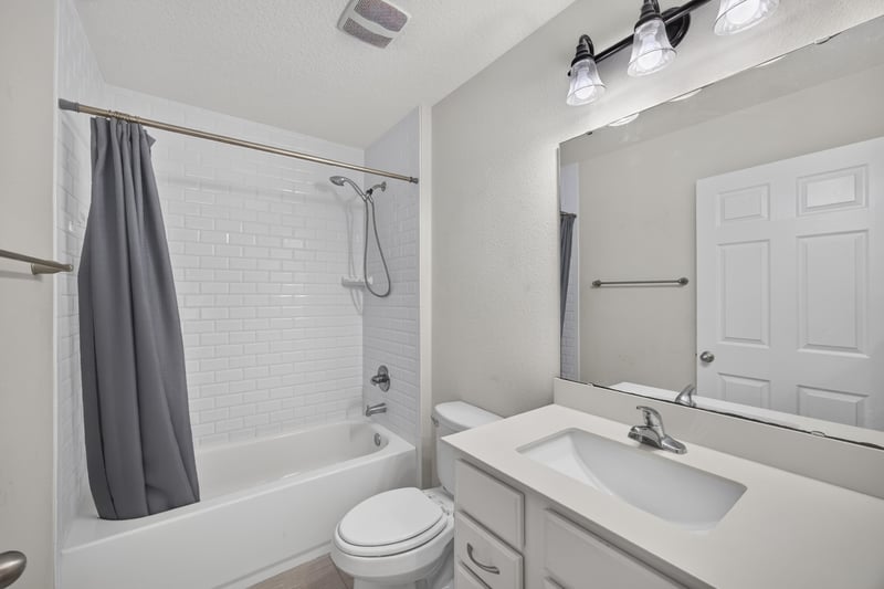 Bathroom with tub-shower and vanity at 1002 Ingleside Ave, Jacksonville, FL 32205