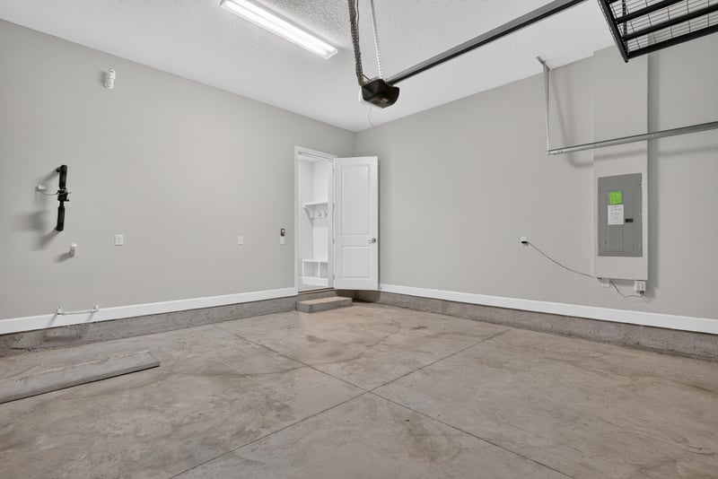 Garage interior with electrical panel at 7446 Loggerhead Ct, Jacksonville, FL 32256