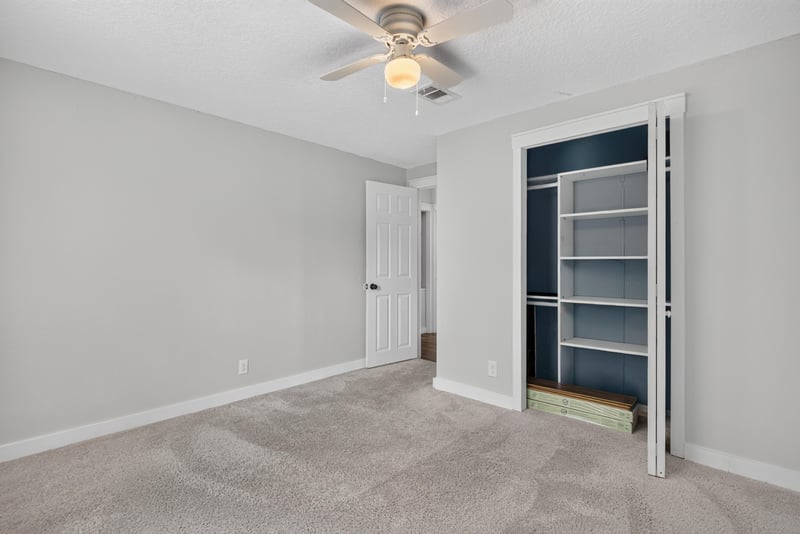 Closet with built-in shelving at 4890 McAllister Rd, Middleburg, FL 32068