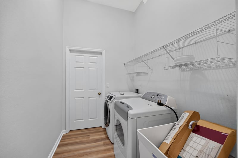 Laundry room with shelving at 3101 E Banister Rd, St. Augustine, FL 32092