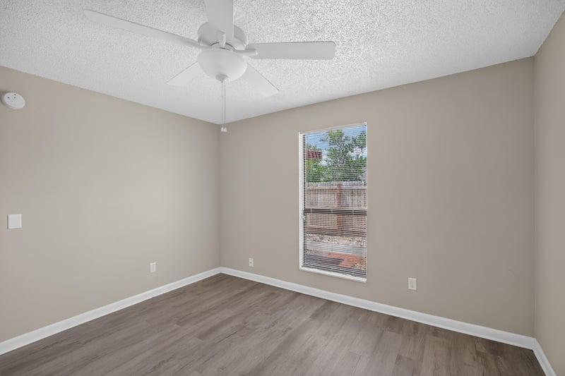 Bedroom with window and ceiling fan at 2717 Trollie Ln, Jacksonville, FL
