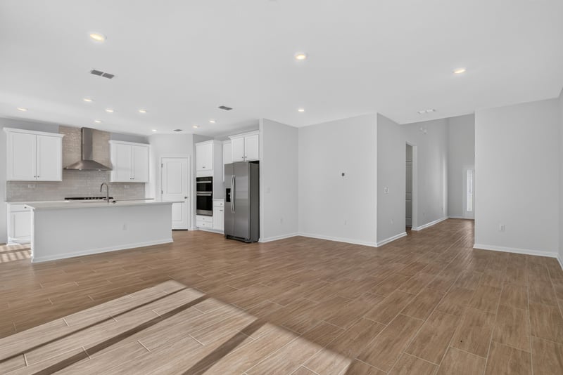 Kitchen with island, double wall ovens and refrigerator at 269 Bluegrass Wy, St. Augustine, FL 32092