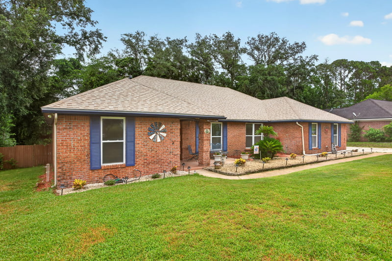 Front exterior view with circular driveway at 981 Marble Ridge Dr, Orange Park, FL 32065