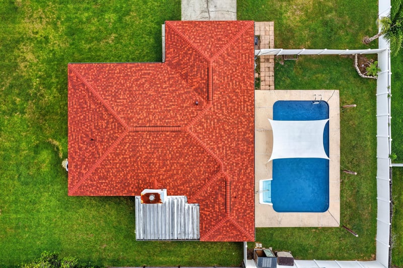 Aerial view directly above the home and pool at 2164 Orangewood St, Middleburg, FL 32068