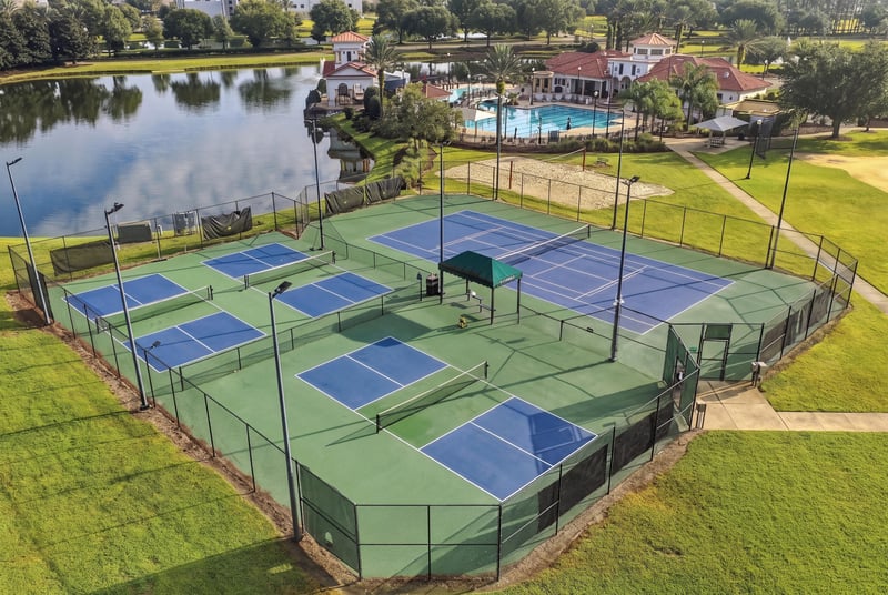 Aerial view of community pickleball courts in Murabella