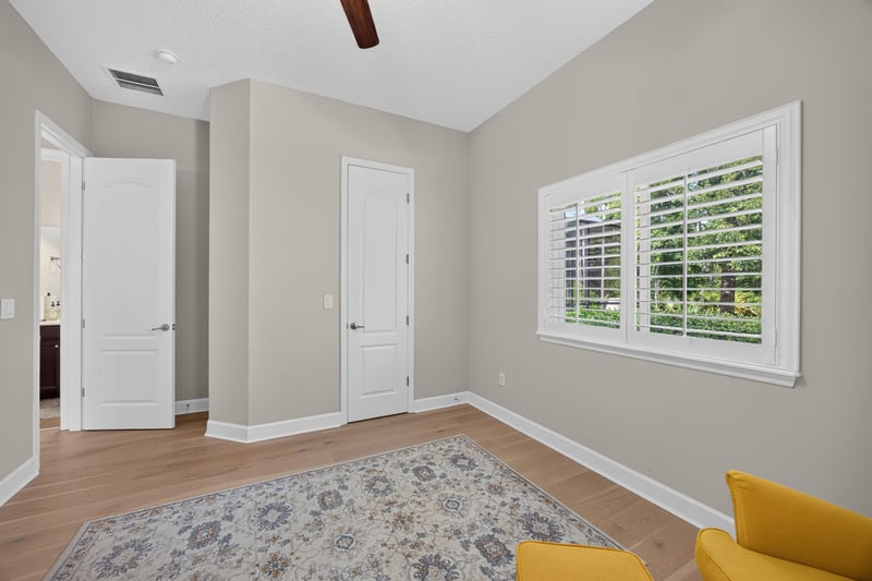Bedroom with plantation shutters at 276 Cross Ridge Dr, Ponte Vedra Beach, FL 32081