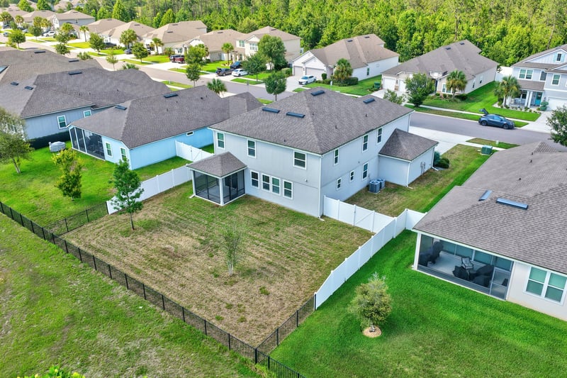 Aerial view of home and surrounding neighborhood at 2580 Cold Stream Ln, Green Cove Springs, FL 32043