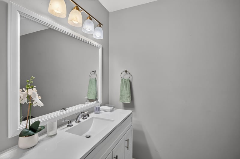 Bathroom vanity with mirror and sink at 9506 Harriet Ave, Jacksonville, FL 32208