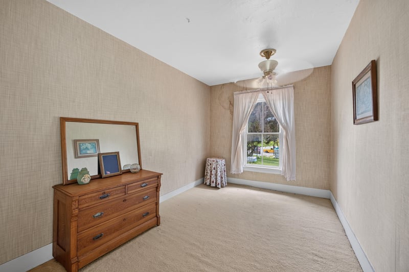 Unfurnished room with dresser and window at 1173 US-17, Satsuma, FL 32189