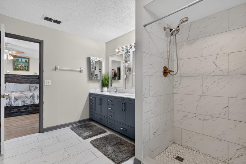 Bathroom with tile shower at 8680 Bandera Cir S, Jacksonville, FL 32244