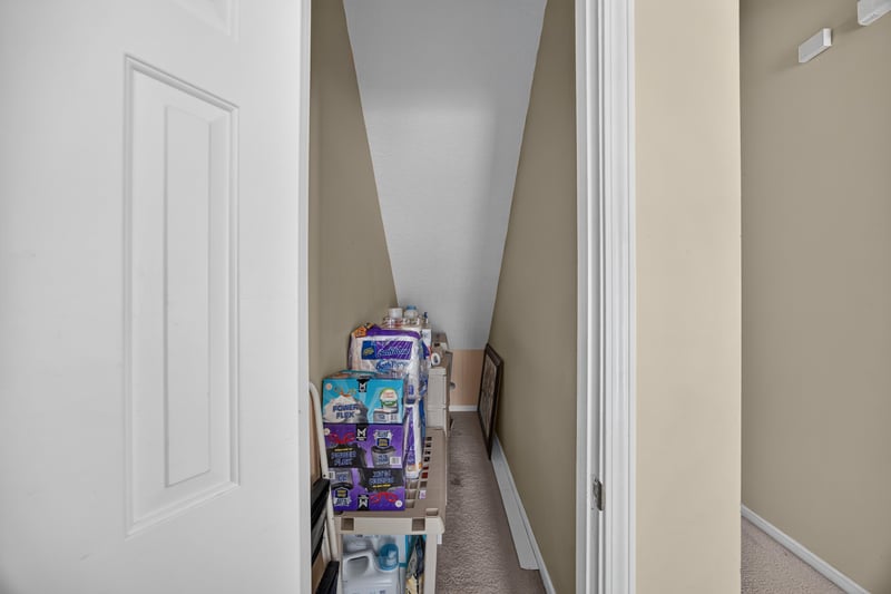 Hallway with storage shelving at 2875 Pebblewood Ln, Orange Park, FL 32065