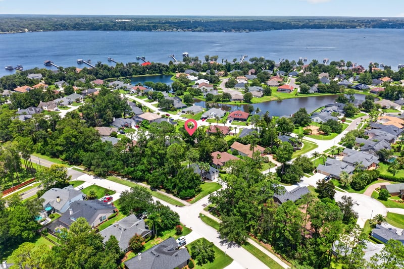 Aerial view of lake and surrounding neighborhood in Fleming Island, FL