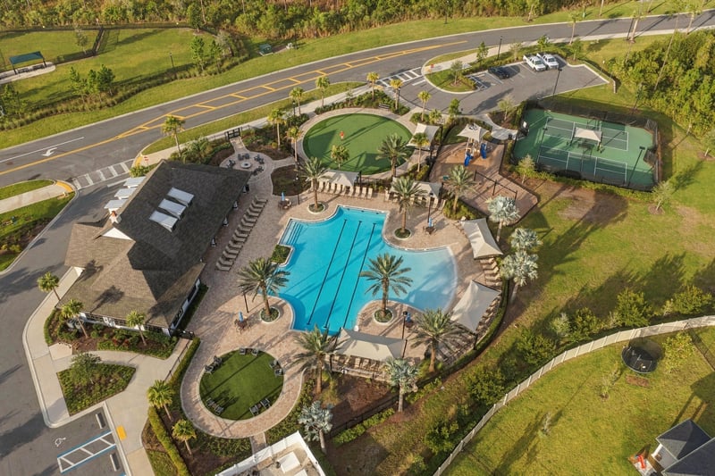 Drone view of community pool and tennis courts, photographed by Megapixeler on Torres Trace, St. Augustine