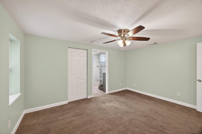 Empty room with carpet flooring and window at 1619 Hammond Blvd, Jacksonville, FL