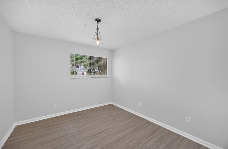 Bedroom with carpet floor and window at 3801 Crown Point Rd unit 2061, Jacksonville, FL 32257
