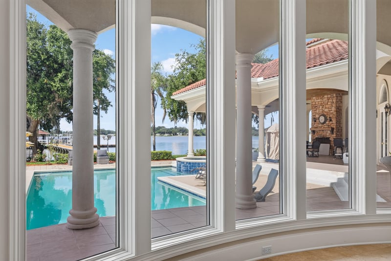 Living room columns framing a pool view at 344 Broward Rd, Jacksonville, FL