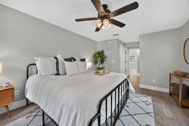 Bedroom with bed and ceiling fan at 1161 Whispering Pines Rd, Jacksonville, FL 32259