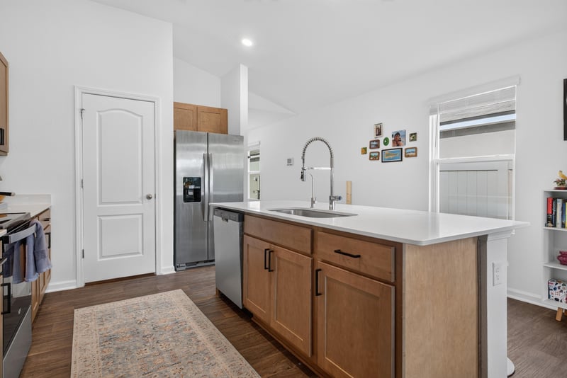 Kitchen sink and refrigerator at 4276 Quaking St, Jacksonville, FL 32218