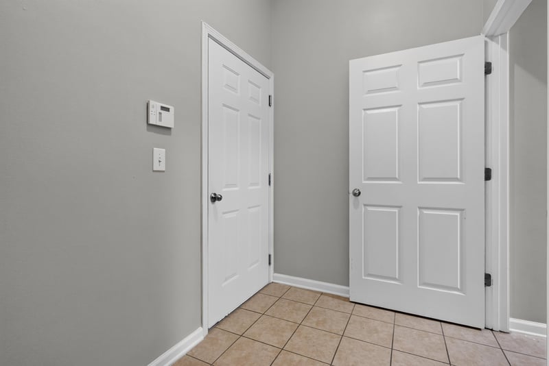 Hallway door with tile flooring at 8196 Cabin Lake Cir, Jacksonville, FL 32256