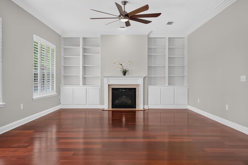 Family room with fireplace and built-in shelving at 4109 Eagle Landing Pkwy, Orange Park, FL 32065