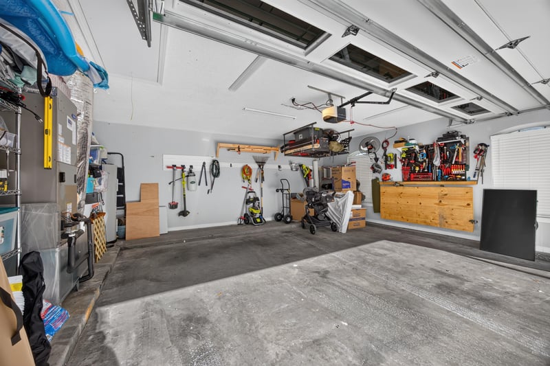 Garage with storage shelves at 12825 Kelsey Island Dr, Jacksonville, FL 32224