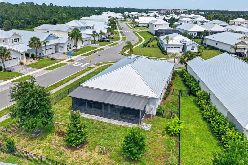 Rear aerial of the fenced backyard at 91 Tilloo Ct, St. Johns, FL