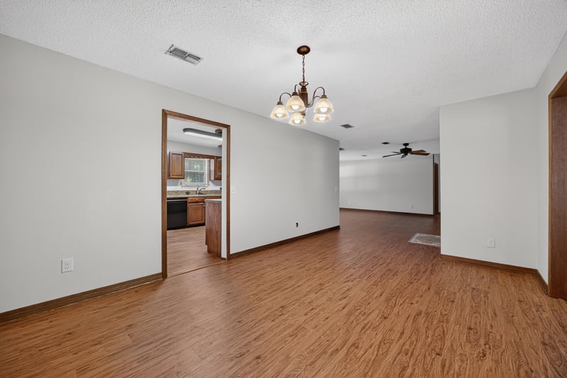 Living area with pass-through to kitchen at 892 Branscomb Rd, Green Cove Springs, FL
