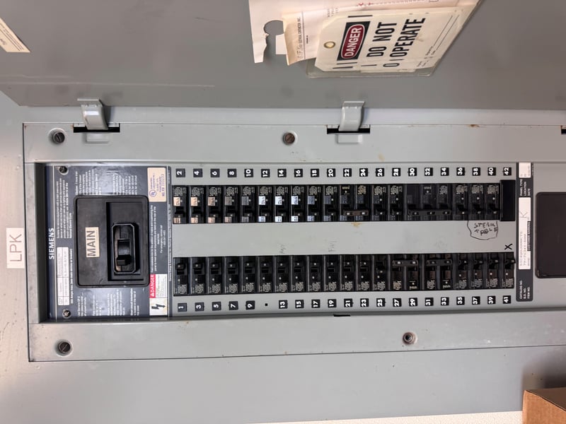 Breaker panel with rows of switches at 11700 New Kings Rd, Jacksonville, FL 32219