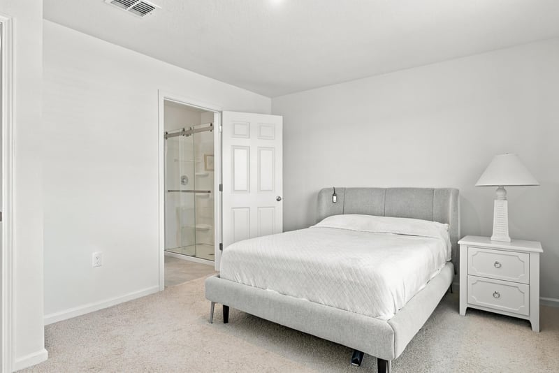 Bedroom with closet and nightstand at 8359 Zenith Cir, Jacksonville, FL 32256