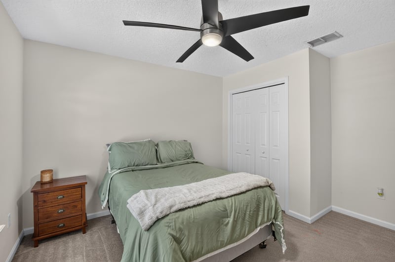 Bedroom with twin bed and dresser at 3660 Middlebrook Dr, Orange Park, FL 32065