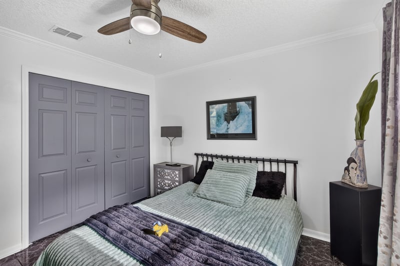 Bedroom closet doors and seating area at 1346 Gately Ct, Jacksonville, FL 32225
