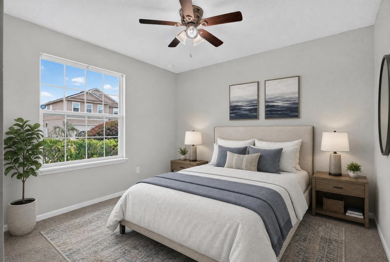 Bedroom with window view and matching nightstands at 10066 Andean Fox Dr, Jacksonville, FL 32222