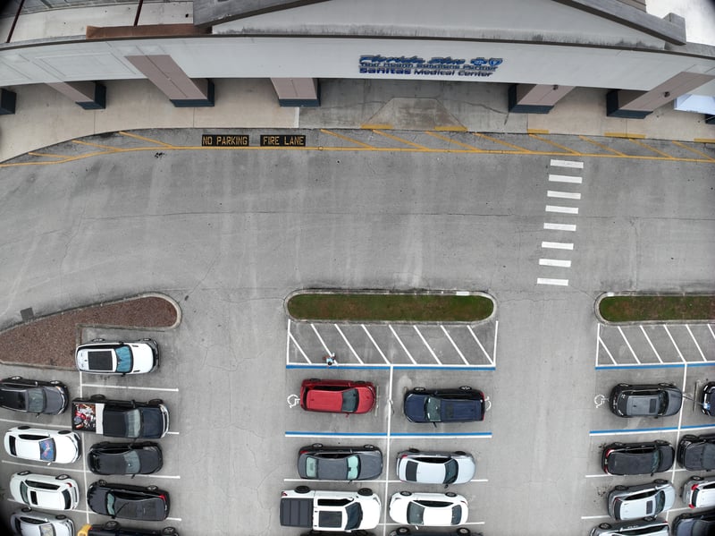 Aerial view of flat rooftop edge above parking lot at 9406 Atlantic Blvd, Jacksonville, FL 32225
