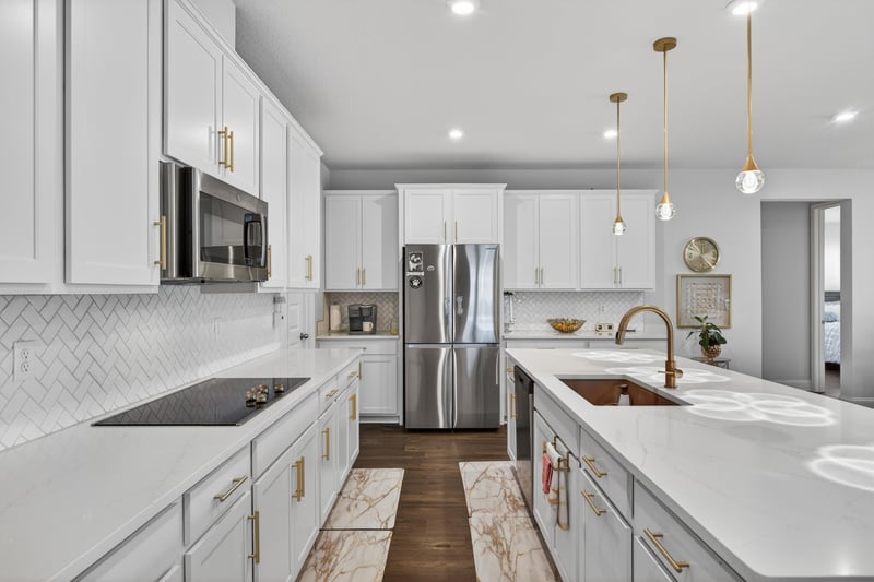 Kitchen with stainless appliances and tile backsplash at 85491 Fall River Pkwy, Fernandina Beach, FL 32034