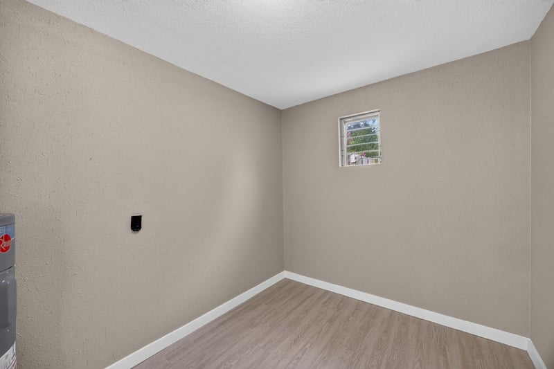 Empty room with electrical outlet visible at 184 Draco St, Orange Park, FL 32073