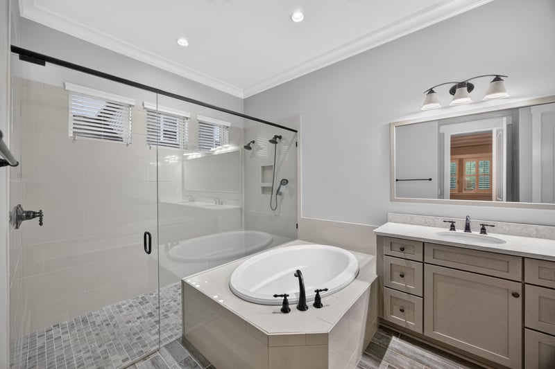 Primary bath with walk-in shower and vanity at 186 Freshwater Dr