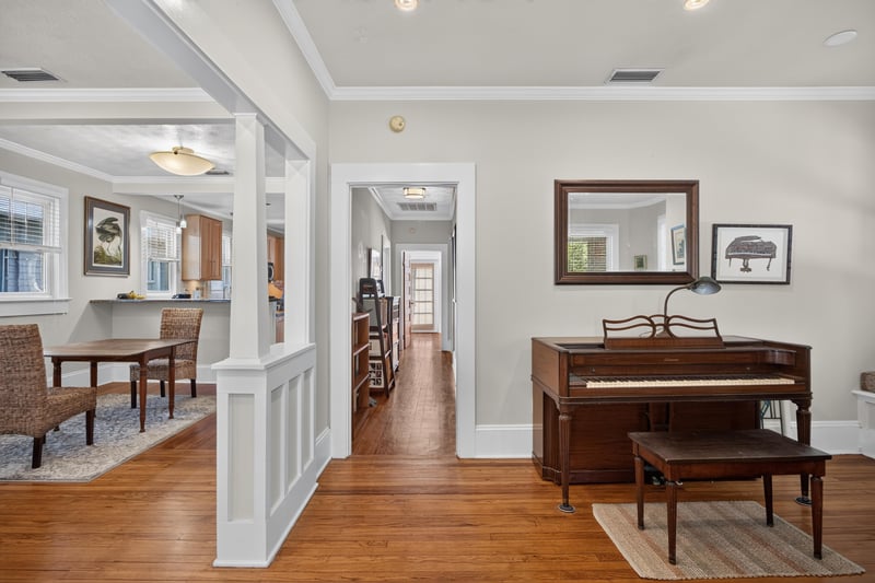 Entry hallway with wainscoting and hardwood floors at 1555 Belmonte Ave, Jacksonville, FL 32207