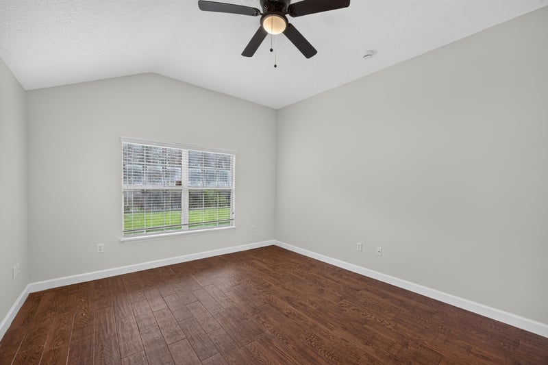Empty carpeted room with window at 706 Bonaparte Dr, Jacksonville, FL 32218