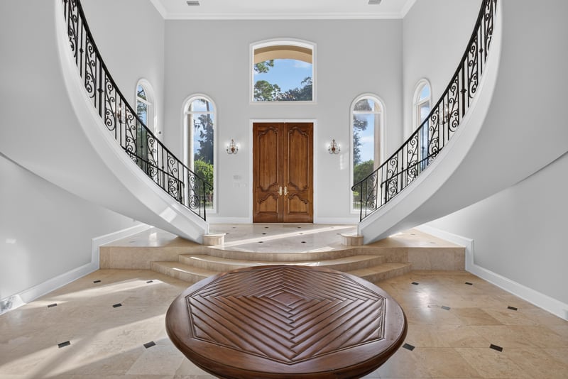 Foyer with arched windows above the entry doors at 344 Broward Rd, Jacksonville, FL