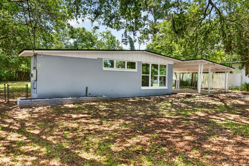 Front exterior close view with windows at 1928 Montmarte Dr, Jacksonville, FL 32210