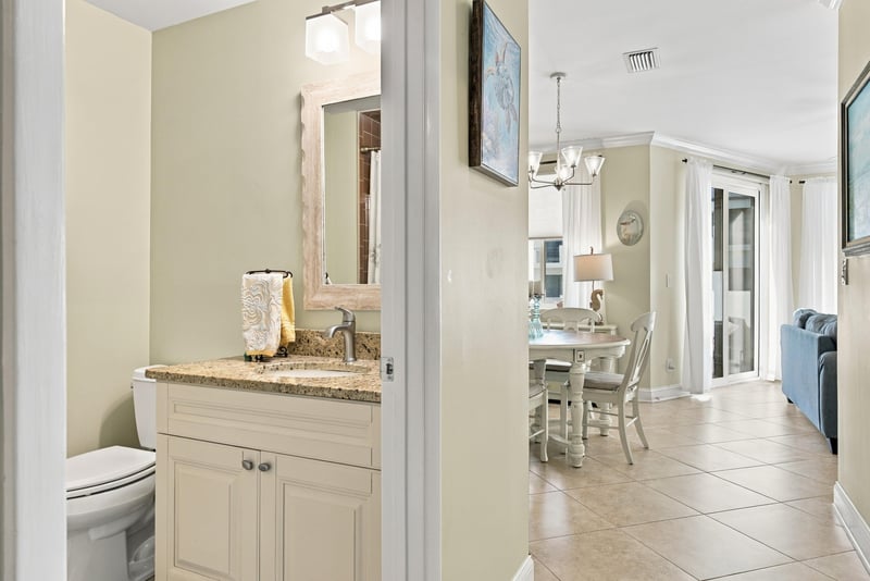 Bathroom vanity with view toward the dining area at 805 Spinnakers Reach Dr, Ponte Vedra Beach, FL 32082