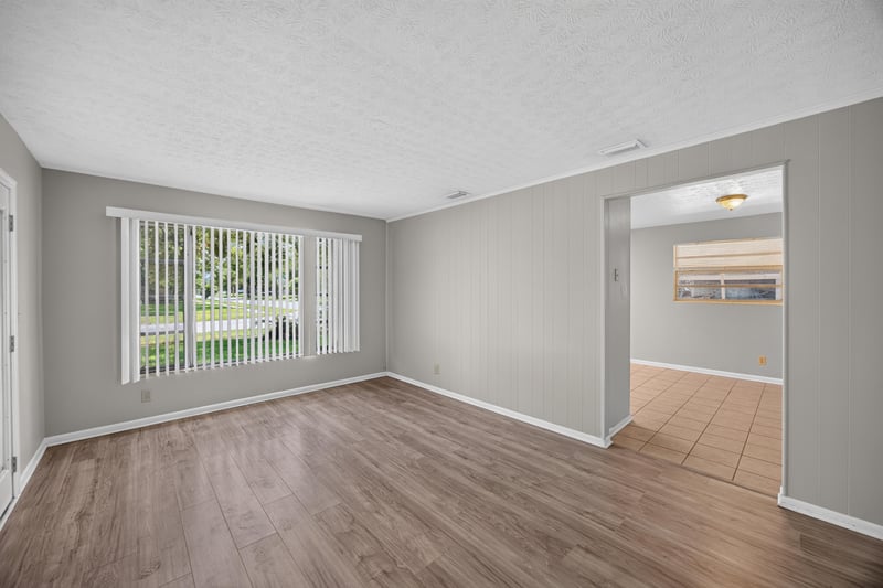 Living room view toward hallway and front door at 5527 Beney Rd, Jacksonville, FL 32207