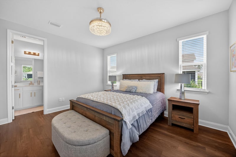 Bedroom with wood floors and window at 85491 Fall River Pkwy, Fernandina Beach, FL 32034