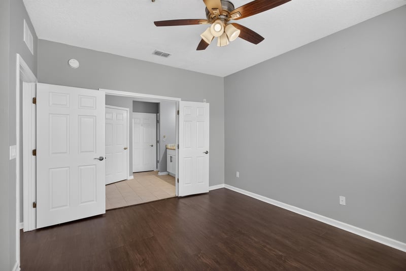Bedroom with closet doors at 11251 Campfield Dr unit 4209, Jacksonville, FL 32256